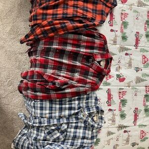 Duluth Trading Co Blue, orange and red flannel Shirt’s.
